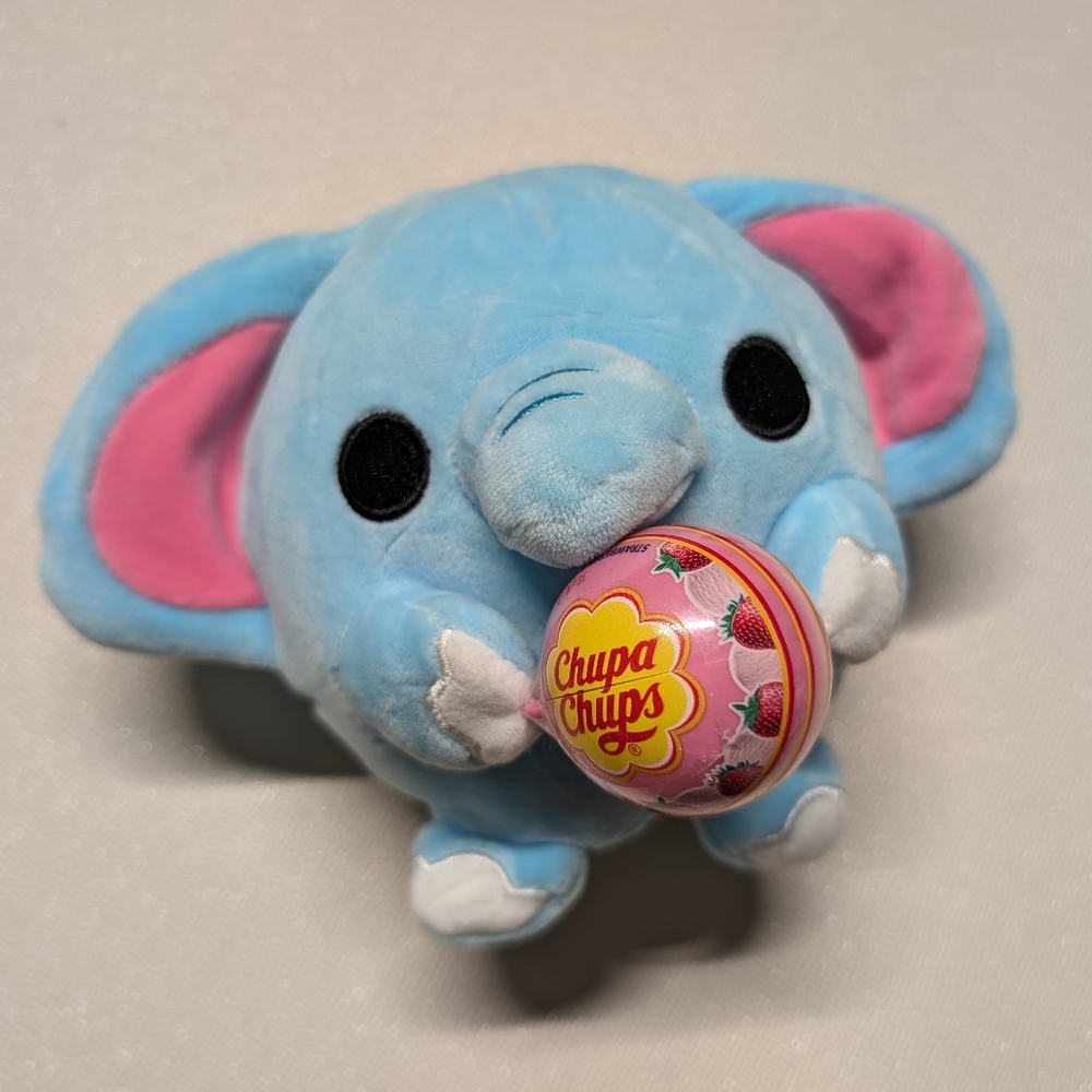 Zuru Snackles Lottie Elephant plush toy holding a Chupa Chups Strawberry